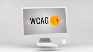 monitor z myszką i klawiaturą, a na monitorze napis wcag 2.1
